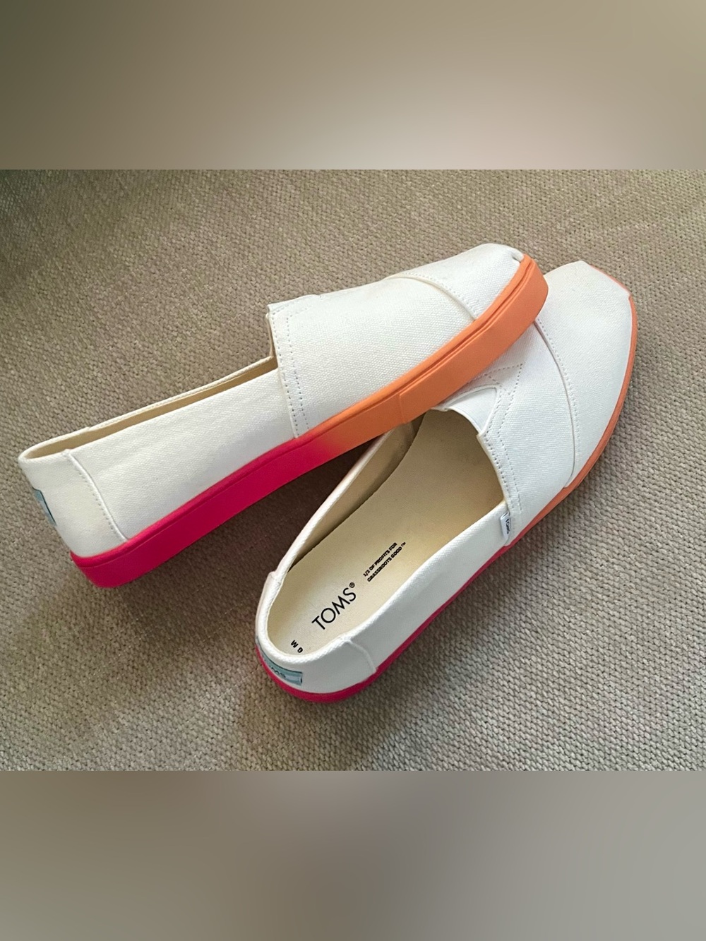 Toms White Canvas Slip-Ons with Pink and Orange Gradient Sole